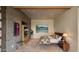 Comfortable bedroom featuring a southwestern aesthetic and a charming view of the outdoors at 30600 N Pima Rd # 61, Scottsdale, AZ 85266