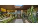 Inviting front entrance featuring a modern design with desert landscaping and a skylight at 30600 N Pima Rd # 61, Scottsdale, AZ 85266
