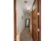 Hallway view showcasing neutral walls and carpet flooring at 30600 N Pima Rd # 61, Scottsdale, AZ 85266