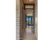 Bright hallway showcasing tiled flooring and a desert view at 30600 N Pima Rd # 61, Scottsdale, AZ 85266