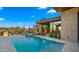 Relaxing pool featuring desert landscaping, comfortable seating, and a tranquil atmosphere at 30600 N Pima Rd # 61, Scottsdale, AZ 85266