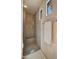 Modern shower featuring tiled walls, a built-in bench, and a mounted towel rack at 30600 N Pima Rd # 61, Scottsdale, AZ 85266
