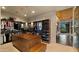 Bright walk-in closet with a center island, custom shelving, and designer lighting at 30600 N Pima Rd # 61, Scottsdale, AZ 85266