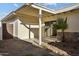 Covered back patio with a sliding glass door leading to the home at 3218 W Clinton St, Phoenix, AZ 85029