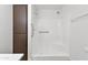 Bright bathroom featuring a walk-in shower and linen closet at 3218 W Clinton St, Phoenix, AZ 85029