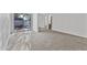 The bedroom shows carpet, a sliding glass door to the patio, and a mirrored closet at 3218 W Clinton St, Phoenix, AZ 85029