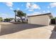 Single-story home featuring an attached garage and extra-long driveway, providing ample parking at 3218 W Clinton St, Phoenix, AZ 85029