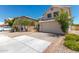 Two-story home featuring a white garage door and well-maintained landscape at 3821 W Barcelona Dr, Chandler, AZ 85226