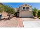 Charming two-story home featuring a well-manicured yard and attached two-car garage at 3821 W Barcelona Dr, Chandler, AZ 85226