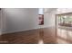 Spacious living room featuring hardwood flooring, neutral paint colors, and ample natural light at 3821 W Barcelona Dr, Chandler, AZ 85226