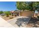Single-story home with two-car garage, desert landscaping, and covered entryway at 41280 W Sanders Way, Maricopa, AZ 85138