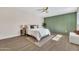 Spacious main bedroom with accent wall and ceiling fan at 4752 N 20Th Ave, Phoenix, AZ 85015