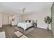 Spacious main bedroom with white bedspread at 4752 N 20Th Ave, Phoenix, AZ 85015