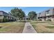Beautifully landscaped community showcasing mature trees and well-maintained sidewalks at 4752 N 20Th Ave, Phoenix, AZ 85015