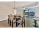 Dining room area with views of the outdoor patio at 4752 N 20Th Ave, Phoenix, AZ 85015