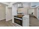 Contemporary kitchen with functional island, and views into other areas of the home at 4752 N 20Th Ave, Phoenix, AZ 85015