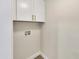 Convenient laundry room with storage cabinets and hookups at 4752 N 20Th Ave, Phoenix, AZ 85015