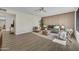 Bright living room with modern decor, stylish furniture, and sleek ceiling fan at 4752 N 20Th Ave, Phoenix, AZ 85015
