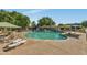 A beautiful community pool with plenty of seating available to enjoy a relaxing day at 4752 N 20Th Ave, Phoenix, AZ 85015