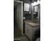 Bathroom vanity with granite countertops and modern decor at 4755 E Gary St, Mesa, AZ 85205