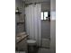Bathroom with shower/tub combination and decorative shower curtain at 4755 E Gary St, Mesa, AZ 85205