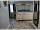Bedroom with matching bedside tables, accent rug and rustic headboard at 4755 E Gary St, Mesa, AZ 85205