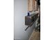 Custom closet shelving holds items with design and wall art for stylish storage in a home at 4755 E Gary St, Mesa, AZ 85205