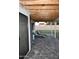 Relax on the stone-paved covered patio complete with comfortable lounge chairs at 4755 E Gary St, Mesa, AZ 85205