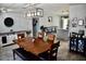 Cozy dining room with wood floors and stylish lighting at 4755 E Gary St, Mesa, AZ 85205