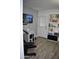 Home exercise room with modern equipment and wood floors at 4755 E Gary St, Mesa, AZ 85205