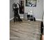 Home exercise room with modern equipment and wood floors at 4755 E Gary St, Mesa, AZ 85205