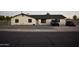 Charming single-story home featuring a well-kept yard and a lovely desert landscape at 4755 E Gary St, Mesa, AZ 85205