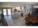 Bright, open-concept kitchen with a center island, stainless steel appliances, and a view of the dining area at 4755 E Gary St, Mesa, AZ 85205
