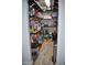 Walk-in pantry with wood shelves for ample food and storage at 4755 E Gary St, Mesa, AZ 85205