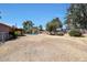 Large backyard with pool, mature trees, and drought tolerant landscaping, great for desert living at 4854 E Blanche Dr, Scottsdale, AZ 85254