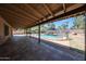 Expansive covered patio overlooking the fenced pool, perfect for outdoor entertaining and relaxation at 4854 E Blanche Dr, Scottsdale, AZ 85254