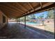 Expansive covered patio overlooking the fenced pool, perfect for outdoor entertaining and relaxation at 4854 E Blanche Dr, Scottsdale, AZ 85254