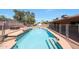Sparkling fenced pool with built-in steps and spa feature, an oasis for summer fun and relaxation at 4854 E Blanche Dr, Scottsdale, AZ 85254