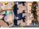 Aerial view of property highlighting the community pool and well-manicured landscaping at 5370 S Desert Dawn Dr # 56, Gold Canyon, AZ 85118