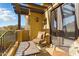 Inviting balcony area with comfortable seating and beautiful natural light perfect for relaxing and enjoying the outdoors at 5370 S Desert Dawn Dr # 56, Gold Canyon, AZ 85118