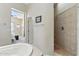 Bathroom with walk-in shower, and view of the bedroom at 5370 S Desert Dawn Dr # 56, Gold Canyon, AZ 85118