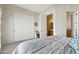 Bedroom with neutral walls, white trim, and ensuite bathroom at 5370 S Desert Dawn Dr # 56, Gold Canyon, AZ 85118