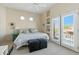 Bright bedroom featuring access to a balcony and decorative built-ins at 5370 S Desert Dawn Dr # 56, Gold Canyon, AZ 85118