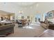 Bright and spacious common area with high ceilings, ample seating, and access to outdoor amenities at 5370 S Desert Dawn Dr # 56, Gold Canyon, AZ 85118