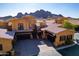 Aerial view of a Mediterranean-style home with a tile roof and mountain views at 5370 S Desert Dawn Dr # 56, Gold Canyon, AZ 85118
