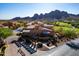 Beautiful community building with well manicured landscaping and golf course and mountain views at 5370 S Desert Dawn Dr # 56, Gold Canyon, AZ 85118