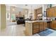 Kitchen and Living room combination with granite counters, stainless appliances and desert views at 5370 S Desert Dawn Dr # 56, Gold Canyon, AZ 85118