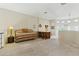 Inviting living area with a cozy daybed and wet bar, creating a relaxed and functional space at 5370 S Desert Dawn Dr # 56, Gold Canyon, AZ 85118