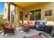 Comfortable outdoor patio with seating, a grill, and ample space for entertaining, offering a seamless indoor-outdoor lifestyle at 5370 S Desert Dawn Dr # 56, Gold Canyon, AZ 85118