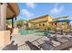 Relaxing community pool and spa area with comfortable seating and desert landscape at 5370 S Desert Dawn Dr # 56, Gold Canyon, AZ 85118
